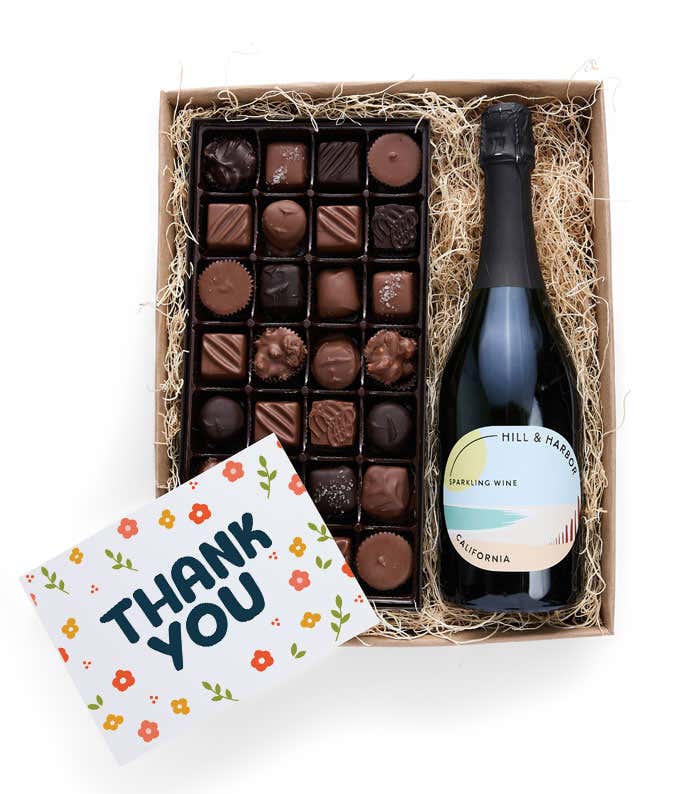 A gift box containing a bottle of California Sparkling Wine by Hill & Harbor, a 1 lb box of 28 assorted gourmet chocolates, and a Thank You card.   A refined combination perfect to show your appreciation.